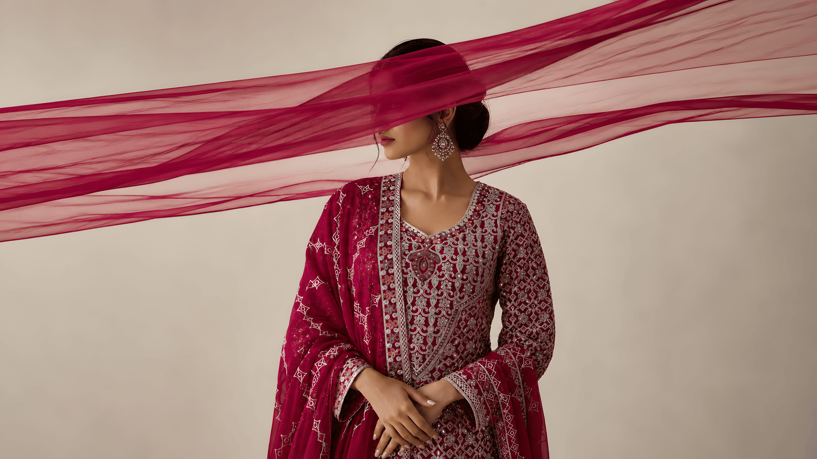 Model wearing a burgundy embroidered Rooh lehenga